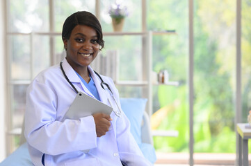 Doctor Pottes is taking care of a patient in a patient room.