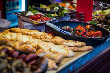 Street food meat vegetables salads on the counter