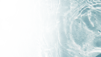 Transparent water waves in sunlight background.
Trendy summer nature banner. Defocused aqua-mint liquid colored clear water surface texture with splashes bubbles with copy space.