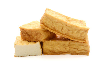 Heap of diced feta cubes isolated on white background