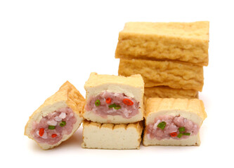 Smoked tofu cubes in wooden bowl