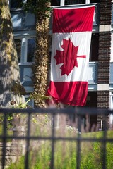Large Canadian Flag Displayed on Building