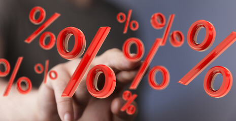 Red percentage signs floating around a hand, illustrating discounts, sales, or interest rates.