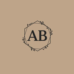 Elegant monogram logo design featuring the letters AB enclosed within a stylish hexagonal frame adorned with delicate floral elements.