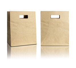 Brown paper bag isolated with reflect floor for mockup