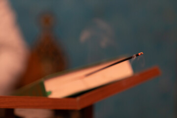 Burning incense among the book, Samarkand, Uzbekistan