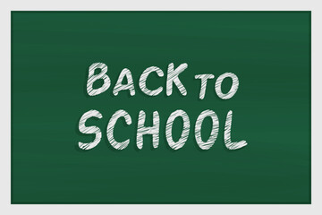 Horizontal banner in the form of a dirty blackboard. Green background with the inscription Back to School. An empty blackboard a worn out texture, a template for poster layouts or restaurant menus.