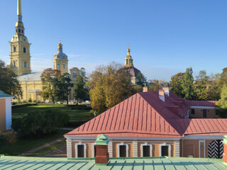 View of the roofs of St. Petersburg and the domes of churches. Horizontal photo, sunny autumn day.