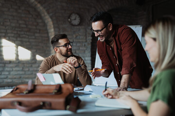 Small business group working together in a office space