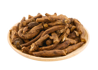closeup pile of dry dandelion root herb for loose tea in wood bowl cutout