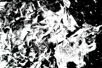 Abstract white background with smeared black paint marks in grunge style. Distressed rough texture resembling ink transfer or stamp smudges. Ideal for overlays, posters, banners or graphic design.