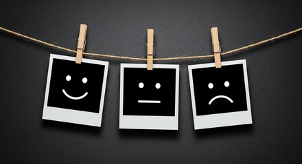 Customer Feedback: Three Polaroid Photos Hanging on a Clothesline Showing Happy, Neutral, and Sad Faces