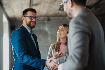 Business people shaking and make business deal