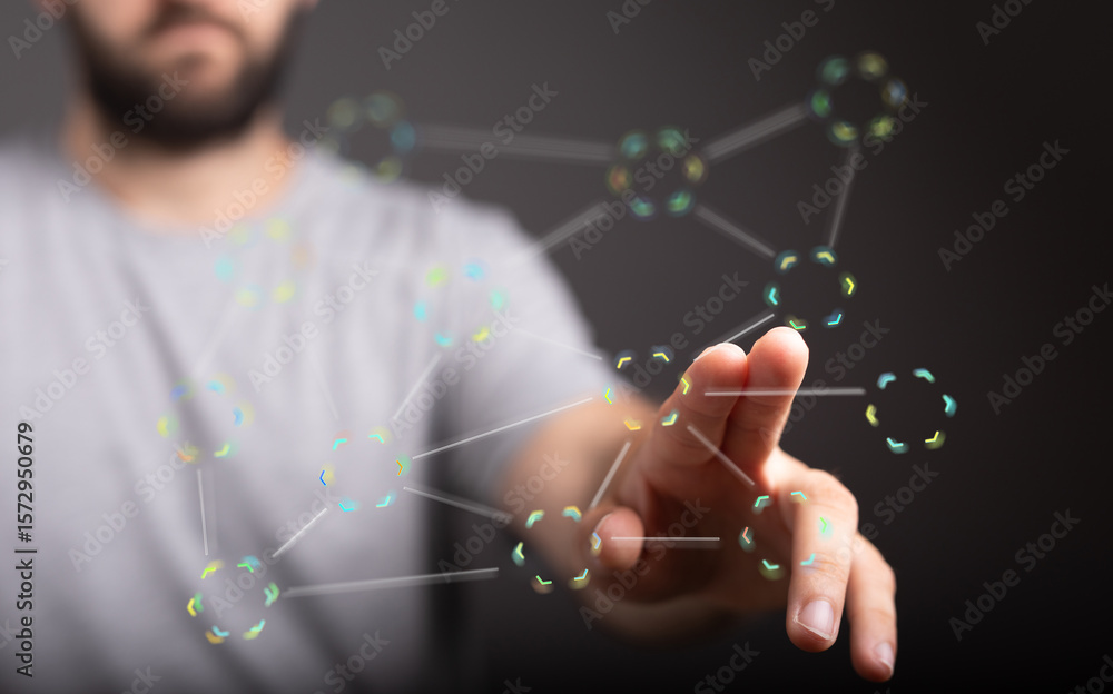 Poster a man's hand interacts with a digital network visualization. represents connection, technology, and 