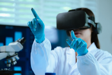 A female scientist wearing virtual reality goggles explores interactive data and medical simulations in a modern laboratory, merging advanced technology with scientific research and innovation.