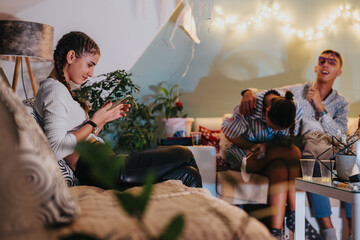 A lively home gathering features moments of connection, relaxation, and joy among family members...