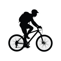 Obraz premium Silhouette of a cyclist with a backpack riding a mountain bike