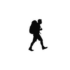 Fototapeta premium Silhouette of Man Hiking with Backpack, Trekking Adventure