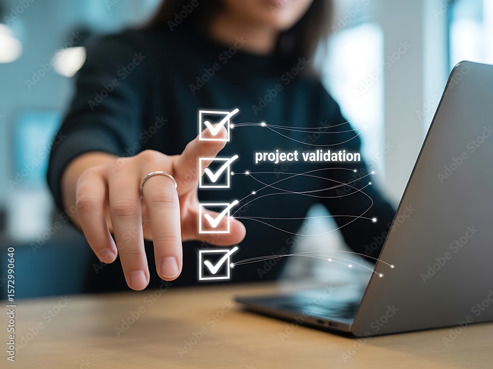 Poster person checking off tasks on a digital checklist near a laptop task completion digital interface