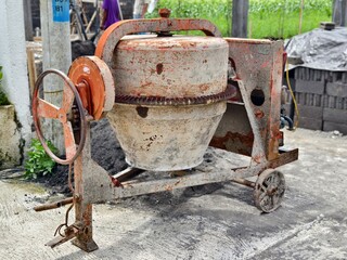 A portable concrete mixer machine at construction site