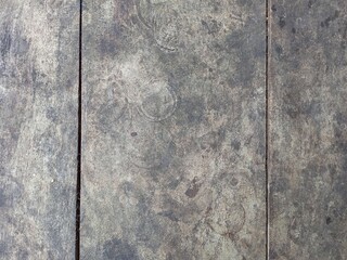 Distressed Dark Wooden Planks Showing Wear and Age