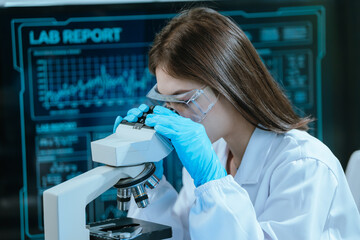 A scientist in a modern laboratory analyzes a blood sample using advanced biotechnology and...