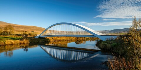 Obraz premium A modern minimalist bridge spanning a quiet river