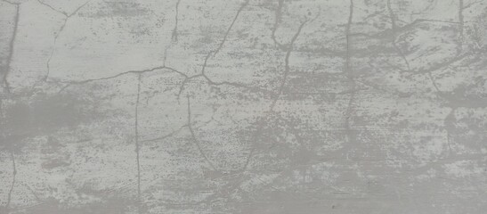 Weathered Gray Concrete Wall with Cracks Texture Background