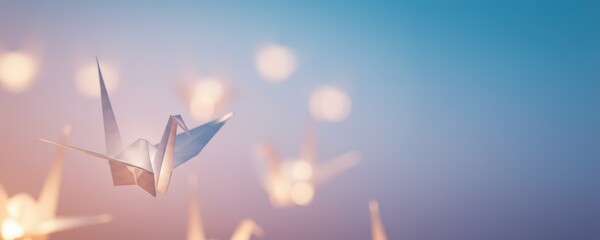 Many origami cranes on a soft blue background. Peace day concept. Traditional japanese bird for good luck and hope. The annual Memorial Day celebration with empty space for banner or poster.