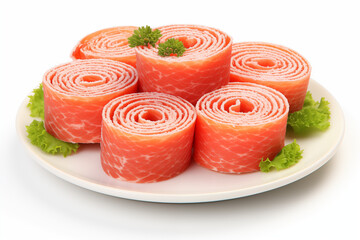 smoked salmon pinwheel rolls served with garnish on white plate