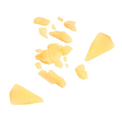 Flying Cheese crumbs isolated on white. Levitating cheese scattered pieces.  Cheese Explosion. Top view. Flat lay.