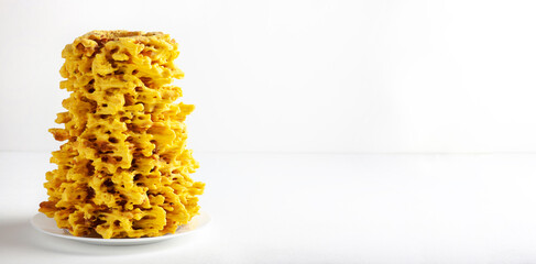 Traditional Lithuanian Sakotis Cake on white background. Banner