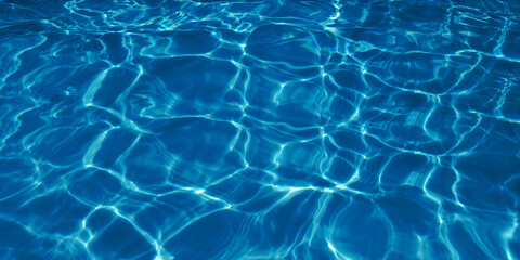 Bright water waves and sunlight hitting the water surface. Modern blue futuristic background