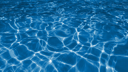 Bright water waves and sunlight hitting the water surface. Modern blue futuristic background