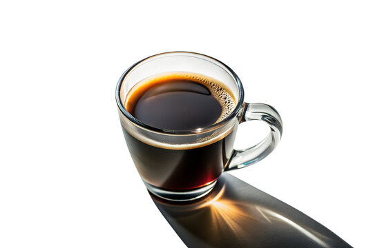 A clear glass cup of hot black coffee casts a long shadow on a bright morning isolated on transparent background