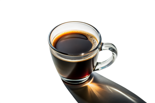 A clear glass cup of hot black coffee casts a long shadow on a bright morning isolated on transparent background