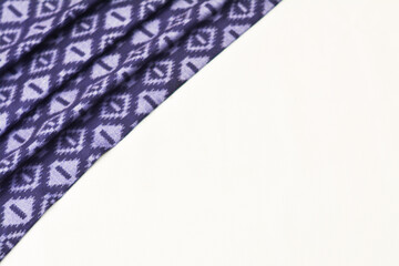 Patterned fabric texture for background, natural textile pattern.