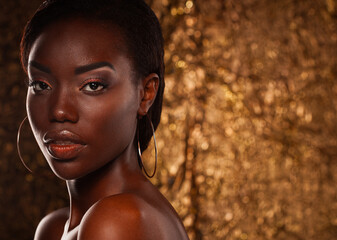 Close-up of a beautiful black woman with fashion make-up.