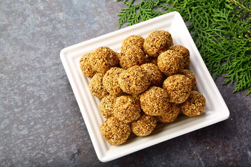 Homemade delicious Indian sweet snack food- sesame balls, ellunda, til ke gole,