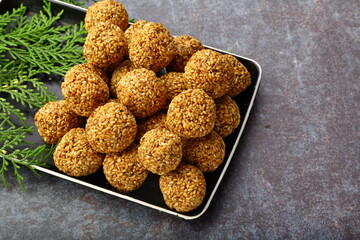Ellunda, or til ke gole delicious  Indian sweet snack  food.