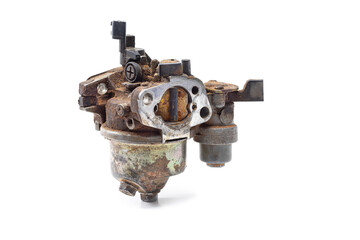 The old carburetor of multipurpose engine is full of dirt and dust isolated on white background