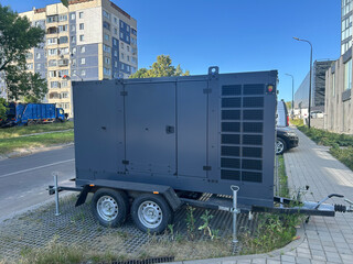diesel electric generator for transportation in front of the building

