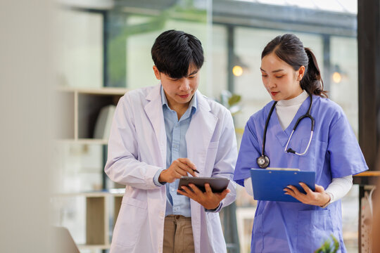 Nurse, doctor or healthcare team with tablet planning schedule, life insurance or medical research online consultation and advice in hospital 
