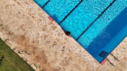 Top view of a swimmer in a pool