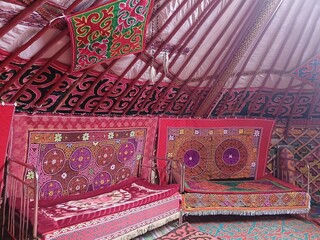 vintage leather sofa tradational kazakh yurt interior with colorful carpets