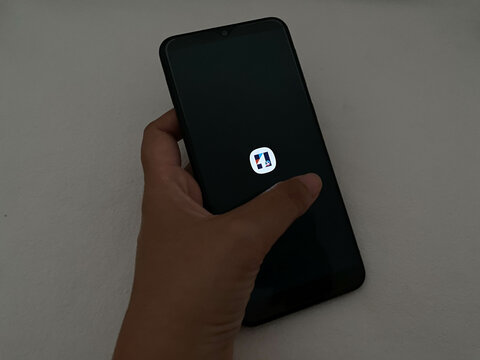 Bekasi, Indonesia - March 22nd 2025: splash screen of IPOT or Indo Premier Online Technology app on android smartphone, an investment application