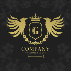 Bird heraldry modern style with a shield and crown logo template Premium Vector