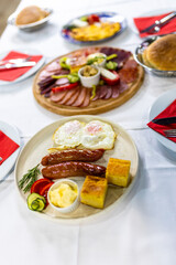 Traditional Serbian Breakfast Table with Meza, Eggs, and Sides