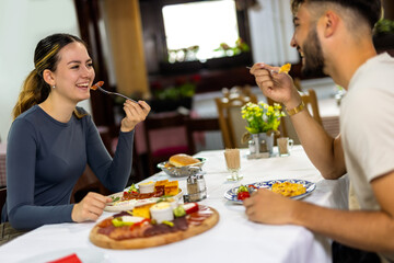 Couple Enjoying Breakfast Together at Resort Restaurant