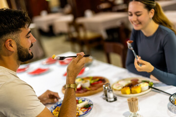 Couple Enjoying Breakfast Together at Resort Restaurant